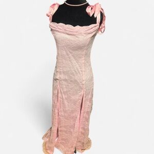 Sparkly pink lace maxi dress with bow accents
New with tags!